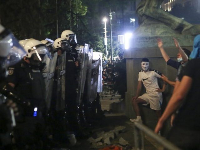 Serbian police arrest 71 protesters, including Brit, as mayhem over Covid-19 restrictions continues
