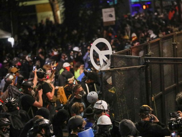 Black protester ATTACKED while trying to stop mob taking down Portland courthouse fence (VIDEO)