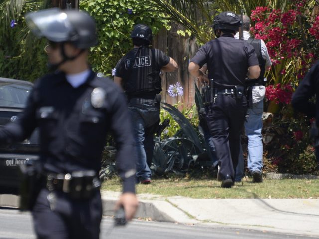 Reports of shots fired at pro-Trump caravan in LA suburb, suspect on the run after standoff with police