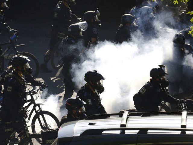 Shocking VIDEO shows Seattle cop pushing his bike over man’s HEAD amid fresh wave of violent protests