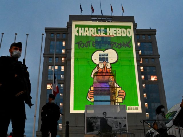 WATCH: Charlie Hebdo cartoons depicting Mohammed & other religions projected across France in tribute to slain teacher