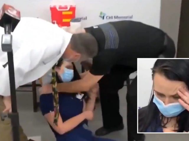 Nurse FAINTS moments after receiving coronavirus jab in another flop for confidence-building PR drive (VIDEO)