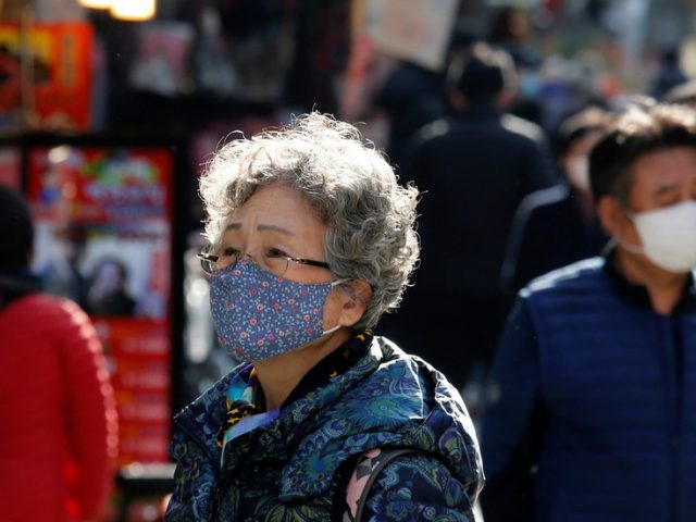 Seoul tightens Covid-19 restrictions to second-highest level amid spike in infections