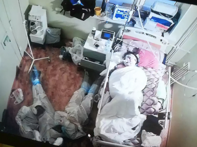 Photo of exhausted young medics piled on floor next to Covid-19 patient on oxygen goes viral in Russia: Here’s the story behind it