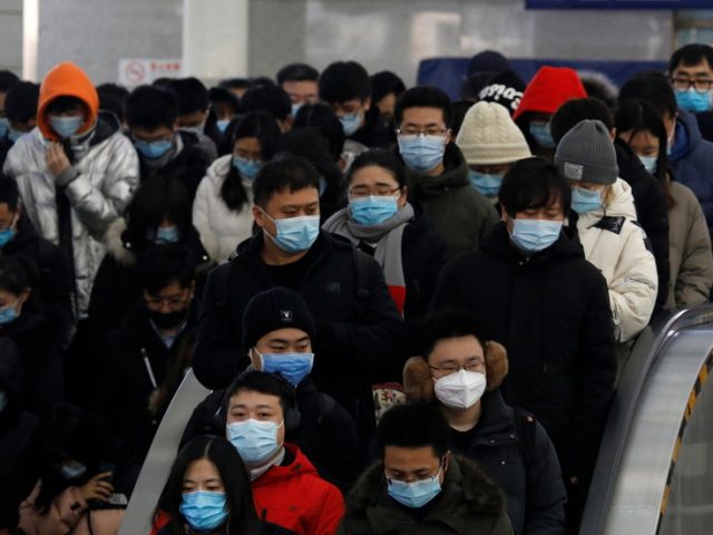 Beijing tightens testing and quarantine rules in effort to curb risks from massive Chinese Lunar New Year migration