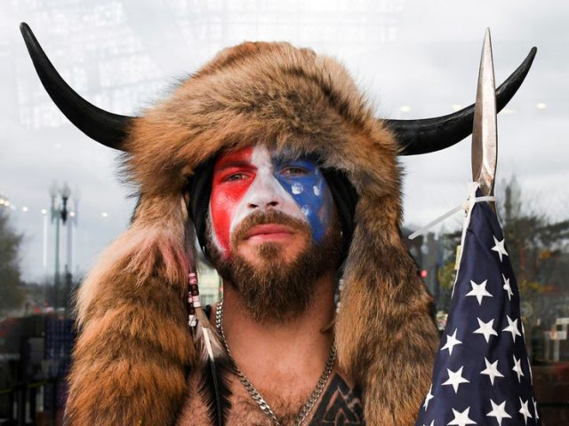 Horn-wearing ‘QAnon Shaman’ charged over Capitol riot says he’s willing to testify at impeachment trial, feels ‘betrayed’ by Trump