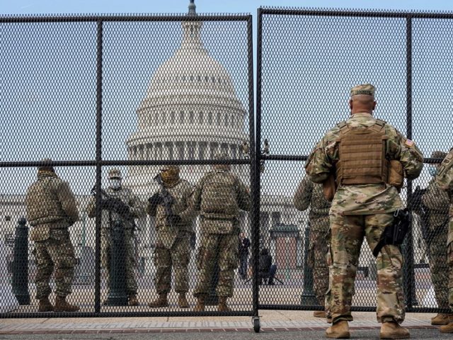‘De-occupy DC’: Two GOP congressmen say ‘QAnon threat’ being hyped to justify permanent fence & troops in US capital
