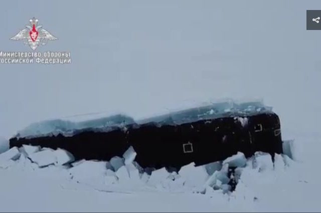 WATCH: Three of Russia’s nuclear submarines spectacularly & simultaneously emerge from under Arctic ice for first time in history