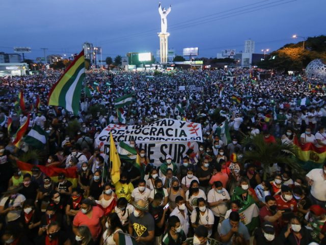 Tens of thousands protest arrest of Bolivia’s ex-president Anez over role in 2019 coup (VIDEOS)