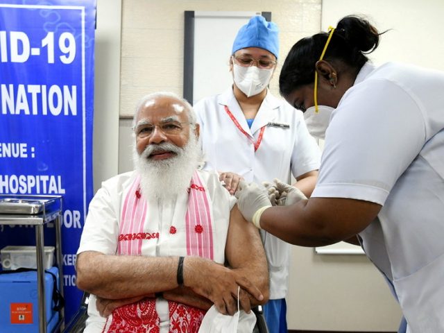 Indian PM Modi receives domestic coronavirus vaccine as country expands inoculation program to seniors