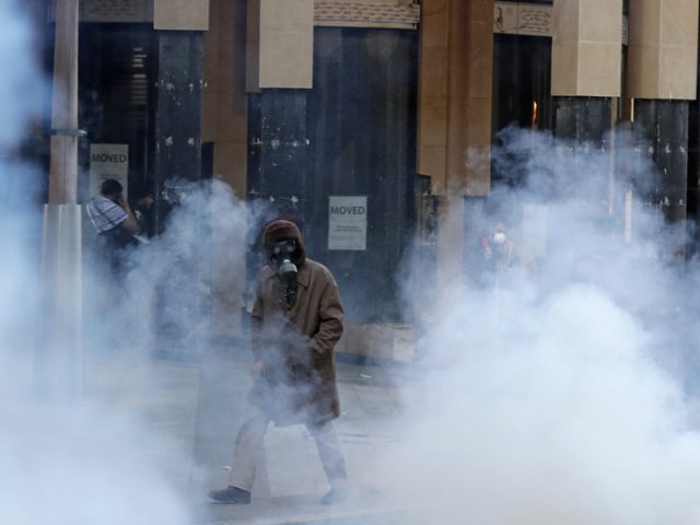 Riot police fire tear gas at protesters as Lebanon’s currency falls to new record low (PHOTOS)
