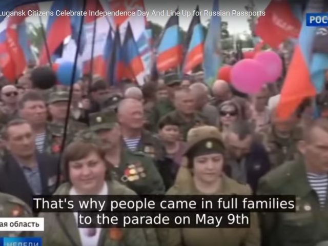 Donetsk and Lugansk Citizens Celebrate Independence Day And Line Up for Russian Passports