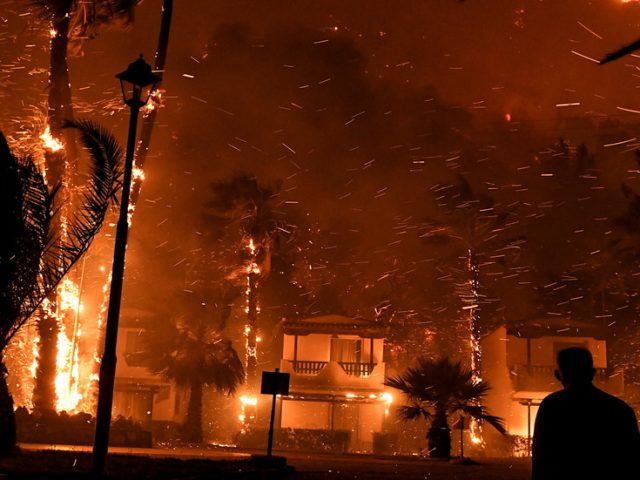 Hundreds evacuated in Greece as fire rages through countryside in Corinth region