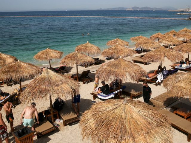 Sun’s out, masks off: Greece scraps mandatory face covering rule outdoors in time for summer, as Covid risk drops