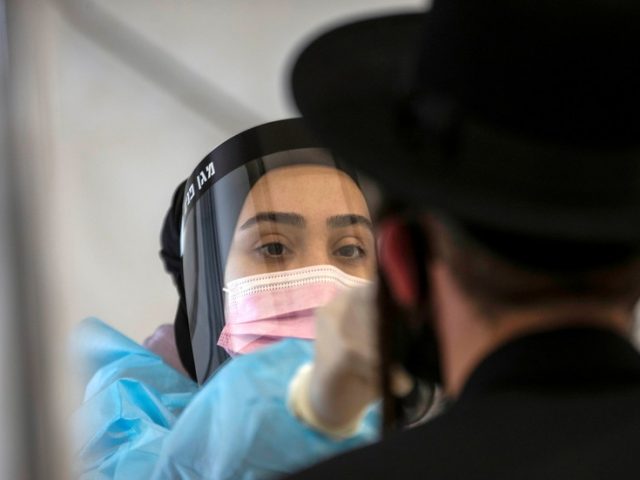 Israel lifts majority of coronavirus restrictions as new cases drop to single digits, but keeps indoor mask mandate