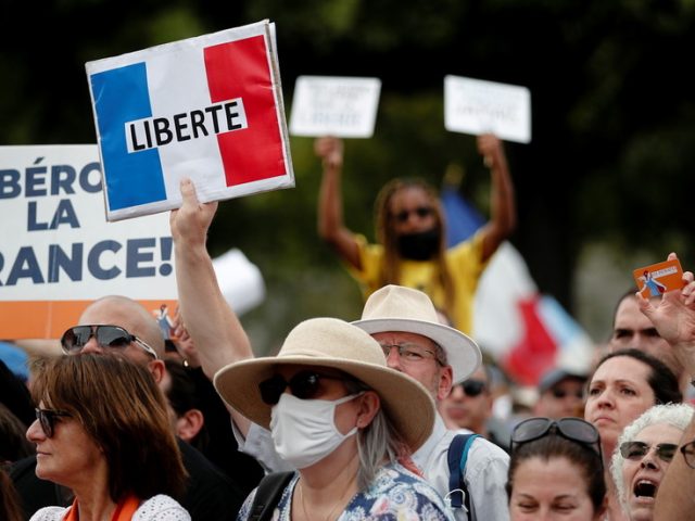 French parliament approves bill forcing vaccination for medical workers & greater health pass use amid growing protests