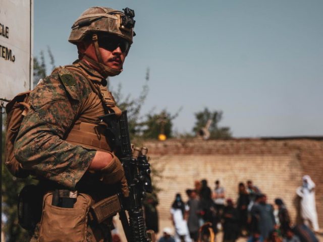 Afghan security forces member killed in gunfight with ‘unknown assailants,’ as US & German troops join battle at Kabul airport