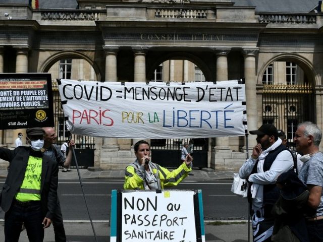 Mass protests kick off in Paris after France’s constitutional court approves controversial Covid legislation (VIDEOS)