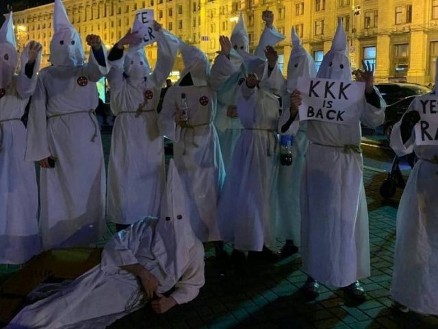 ‘Yes, we are racists’: Group of Ukrainians filmed marching in Kiev dressed as Ku Klux Klan on Halloween