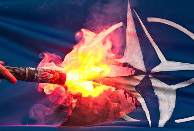 NATO, the firefighter-arsonist