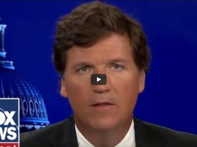 Tucker: We are at war with Russia