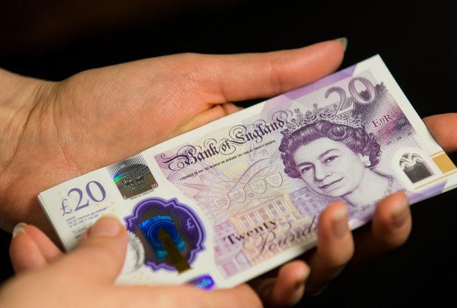 UK sees new inflation-driven cash withdrawal record