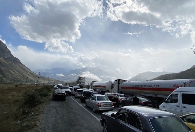Cars line up to enter Russia from Georgia